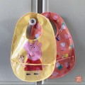 bavoir-en-toile-ciree-all-over-peppa-pig (2).jpg